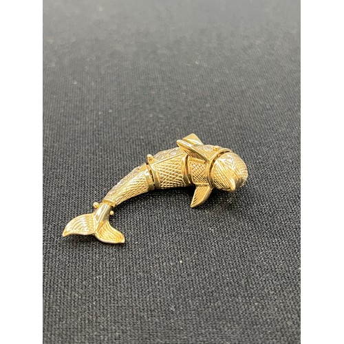 450A - 9ct Gold articulated dolphin pendant 24.8g Grams gross