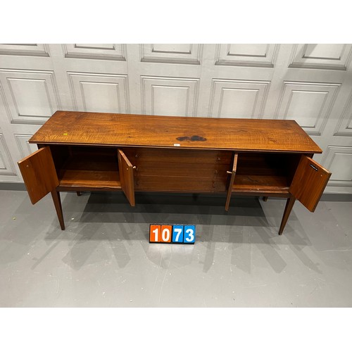 1073 - A Younger mid century teak sideboard