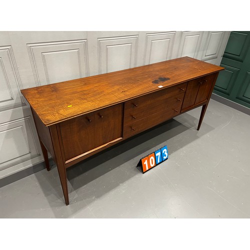 1073 - A Younger mid century teak sideboard