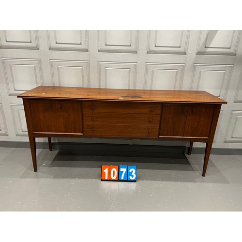 1073 - A Younger mid century teak sideboard