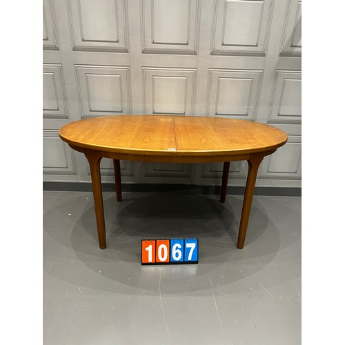 1067 - McIntosh mid century teak extending dining table