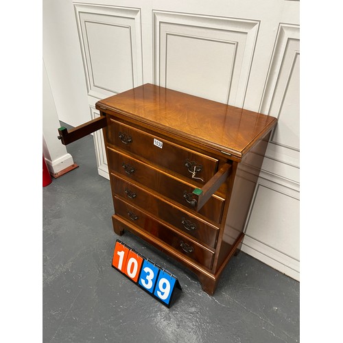 1039 - Flame mahogany chest with flip top server