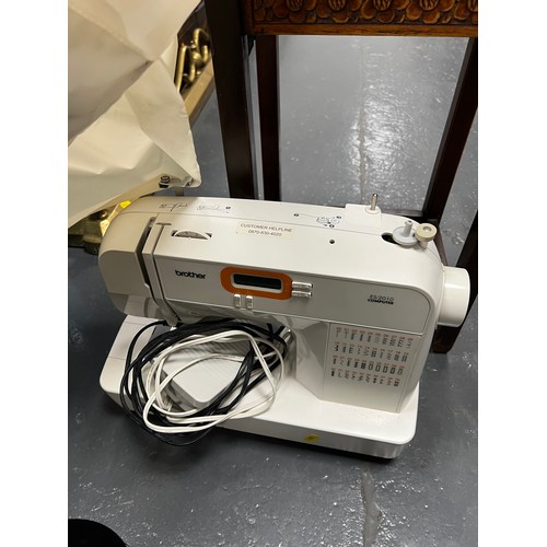 59 - Carved small table + brother electric sewing machine