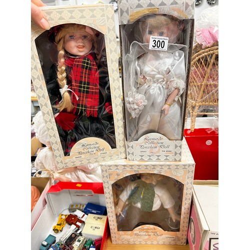 300 - 4 Boxed Dolls