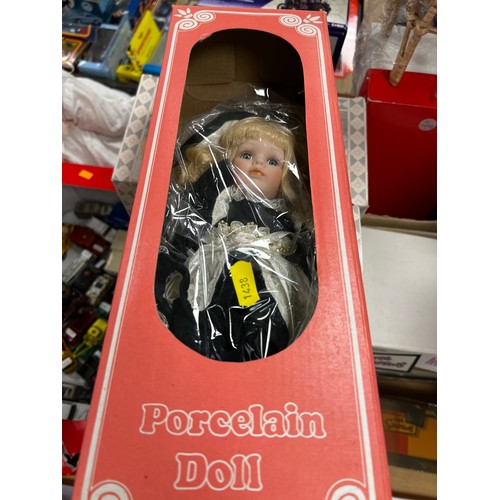 300 - 4 Boxed Dolls