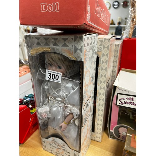 300 - 4 Boxed Dolls