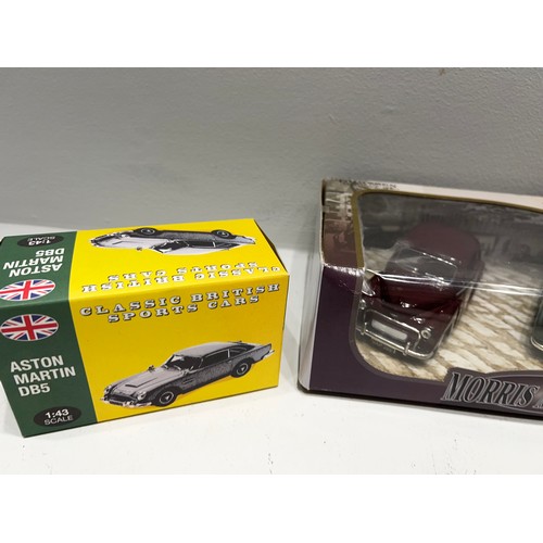 294 - 3 Boxed collector’s Cars Aston Martin DB5,Morris Minor 1000, Ltd edition Triumph Herald Saloon