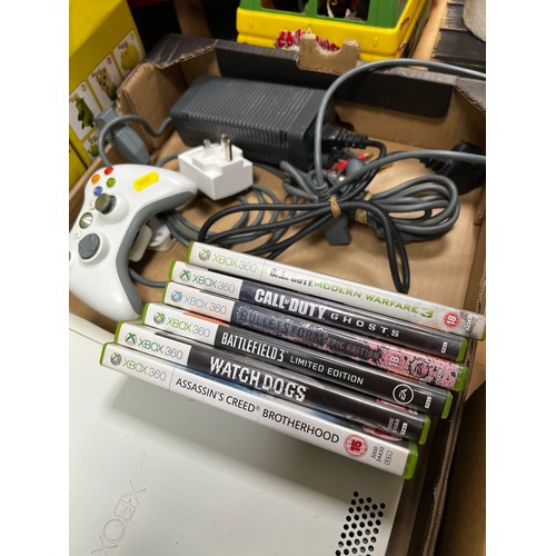 267 - Xbox 360 games console with games