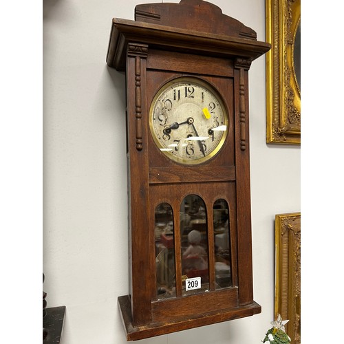 209 - Oak cased Wall clock