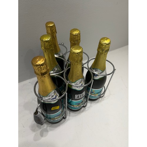 419 - 6 Vintage Bottles Babycham unopened in rack