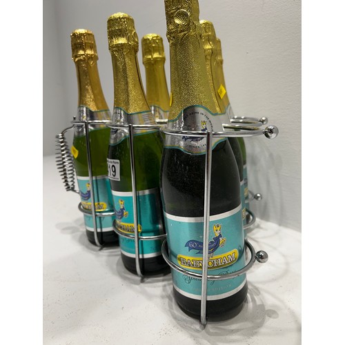 419 - 6 Vintage Bottles Babycham unopened in rack