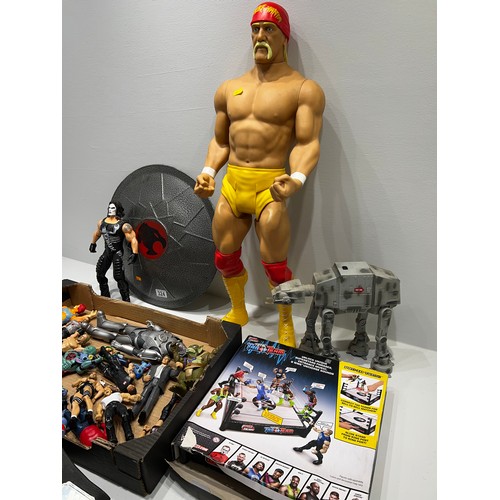 324 - Box WWF Wrestling Figures +large Hulk Hogan Figure + rocking horse etc