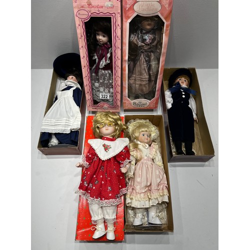 322 - 4 Porcelain Dolls Boxed