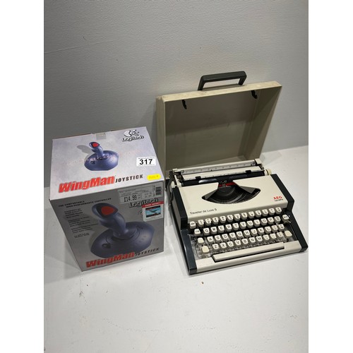 317 - Vintage AEG portable typewriter + Wingman joy stick