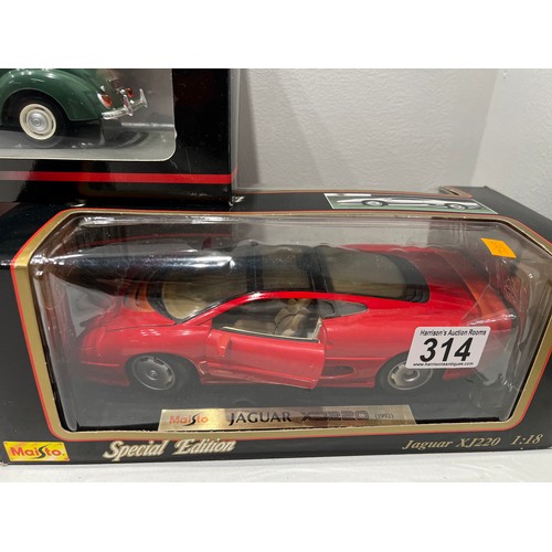 314 - 3 Boxed Die-cast metal Cars Jaguar/ Mini/ Porsche