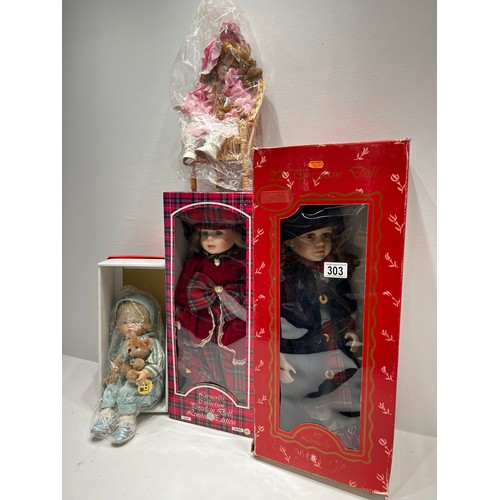 303 - 3 Boxed Dolls