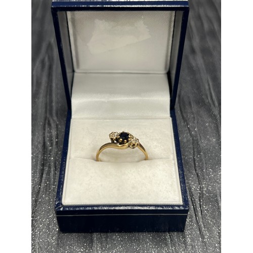 506 - 9ct Gold Sapphire /Diamond Ring 2g gross size P/Q