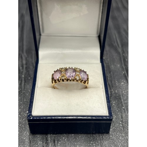 503 - 9Ct Gold 3 Stone Amethyst Ring 4.3g gross size U