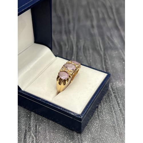 503 - 9Ct Gold 3 Stone Amethyst Ring 4.3g gross size U