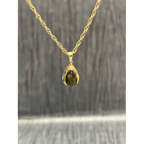 530 - 9ct Gold Necklace with Pear shape Borealis Stone set in 9ct gold mount. 18 1/2” long 6.1 g gross