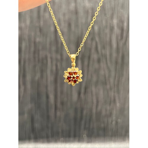 535 - 9ct Gold 7 Stone Ruby Pendant on 9ct Gold Chain 3.1g gross  18 1/2” long