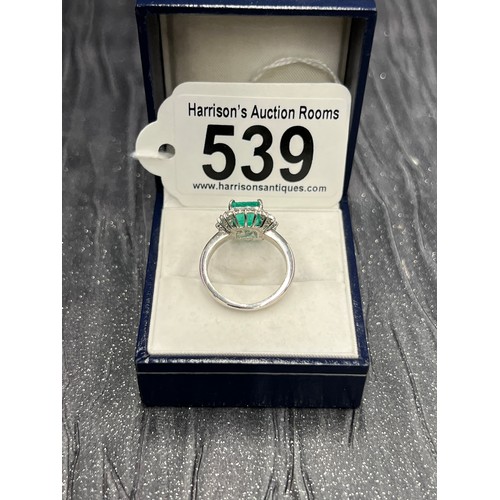 539 - Platinum Emerald & Diamond Ring Emerald is 1.99ct         size L/M