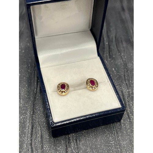 554 - Pair 9ct gold Ruby/Diamonds Earings 1.9g gross