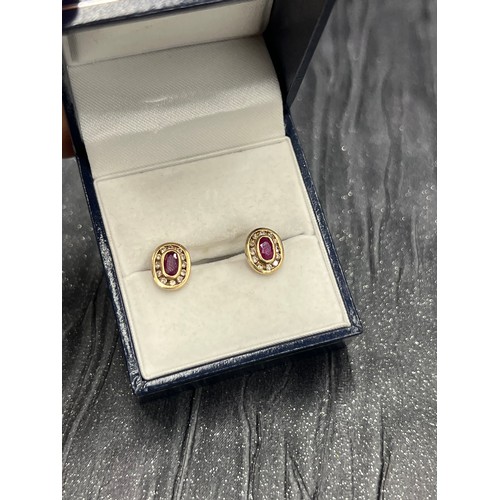 554 - Pair 9ct gold Ruby/Diamonds Earings 1.9g gross