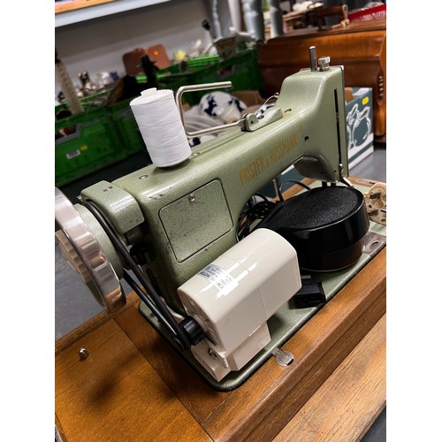 584 - Vintage Electric Frister & Rossmann Sewing Machine in case with key