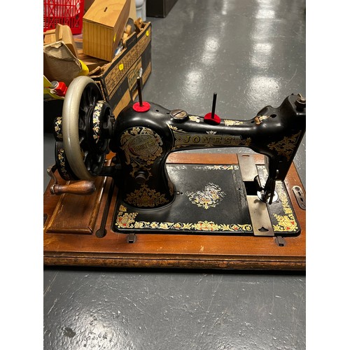 590 - Vintage Jones hand sewing machine in case with key