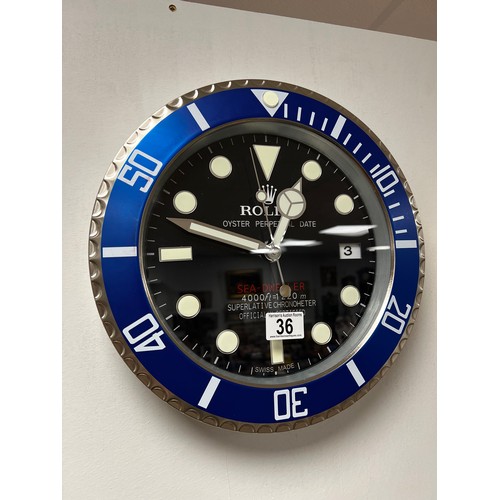 36 - Rolex officially-licensed dealer wall clock working