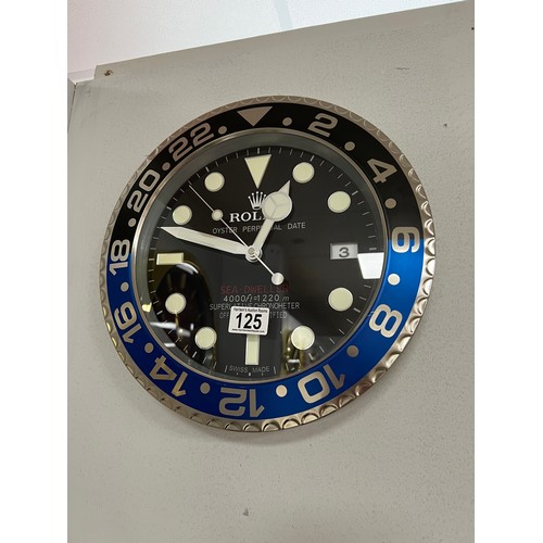 125 - Rolex officially-licensed dealer clock working