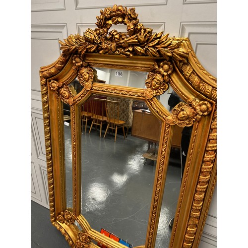 1186 - Very impressive ornate gilted mirror with bevelled edging 43