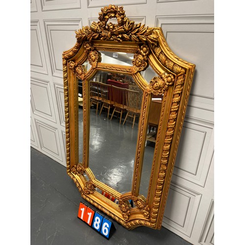 1186 - Very impressive ornate gilted mirror with bevelled edging 43