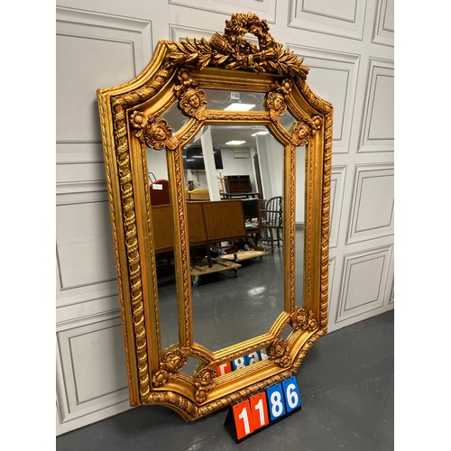 1186 - Very impressive ornate gilted mirror with bevelled edging 43