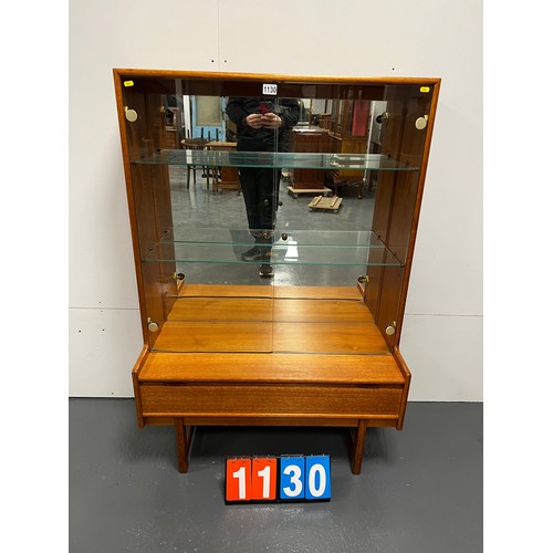 1130 - Mid century teak glass door display cabinet/ bookcase