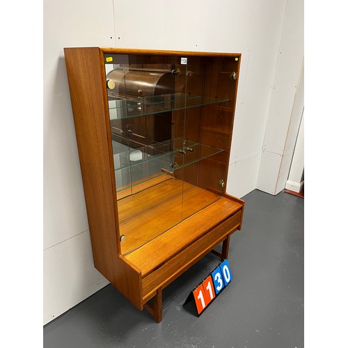 1130 - Mid century teak glass door display cabinet/ bookcase