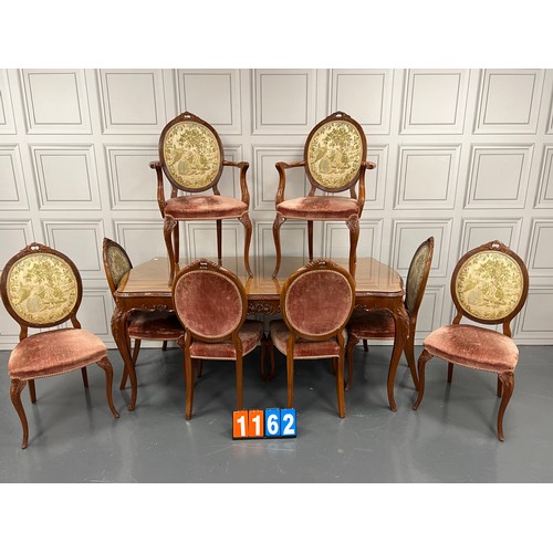 1162 - Large french walnut table & 8 chairs good pattern material to chairs