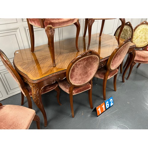 1162 - Large french walnut table & 8 chairs good pattern material to chairs