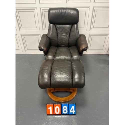 1084 - Retro leather swivel chair & footstool ekorness?