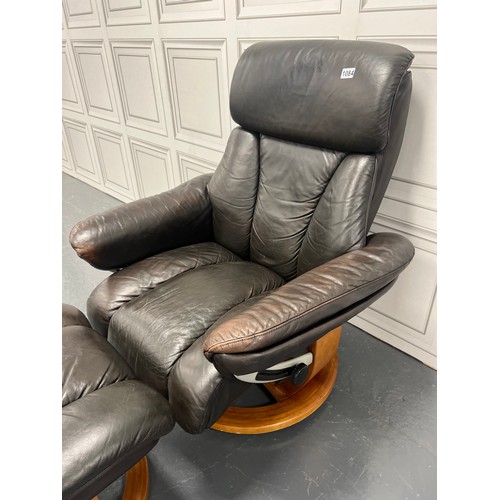 1084 - Retro leather swivel chair & footstool ekorness?