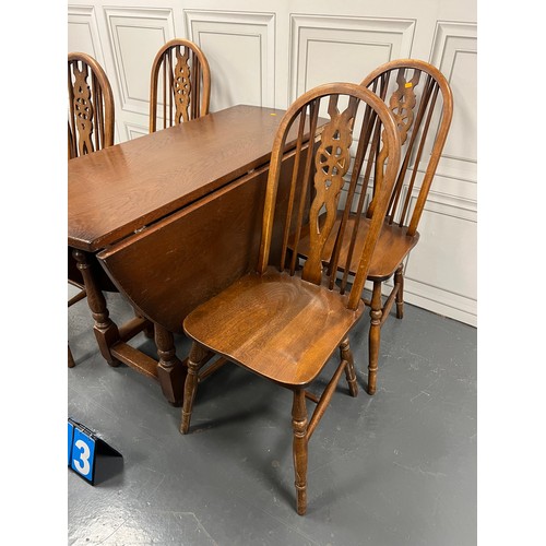 1013 - Old charm oak drop leaf table + 4 wheel back chairs