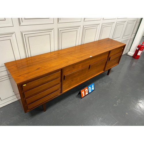 1204 - Mid century teak larger size sideboard sleek design danish?