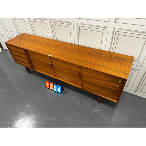 1204 - Mid century teak larger size sideboard sleek design danish?