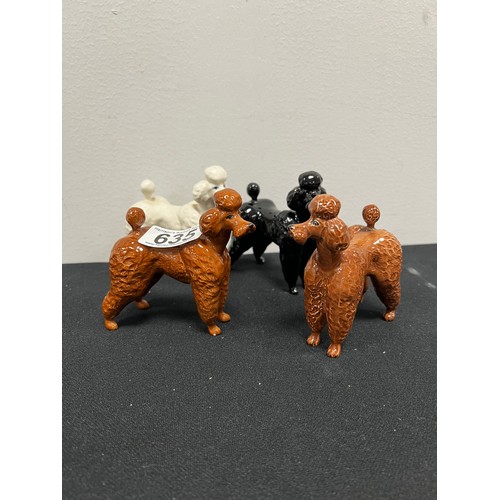 635 - 4 Beswick poodle dogs