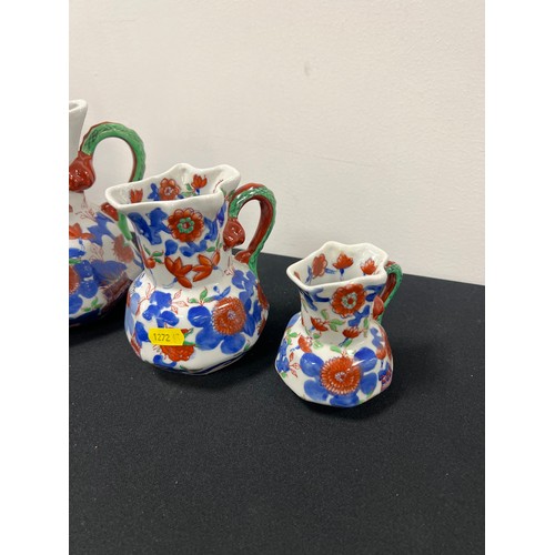 296 - Graduated set of 4 jugs