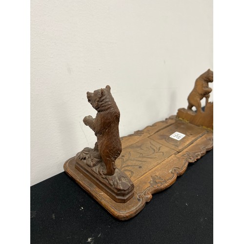 281 - Early 20th century black forest bear book stand a/f