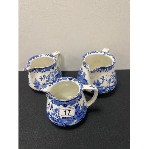 17 - 3 Vintage graduated willow pattern jugs