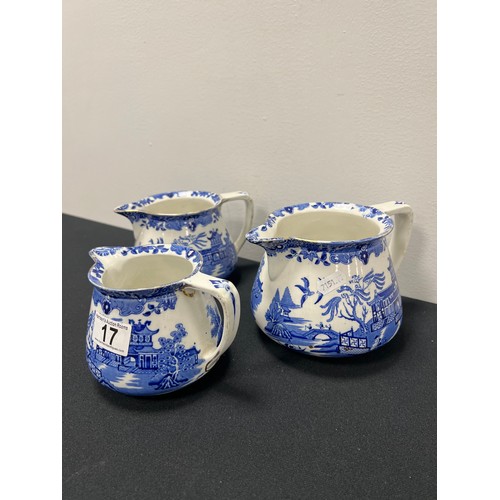 17 - 3 Vintage graduated willow pattern jugs