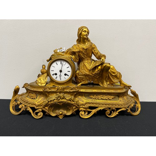 567 - Gilt clock with figure on stand with key